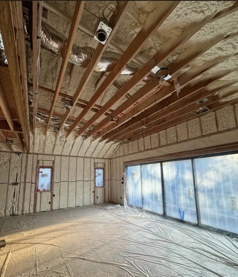 Interior walls and ceiling insulated with spray foam during new construction in Holdenville