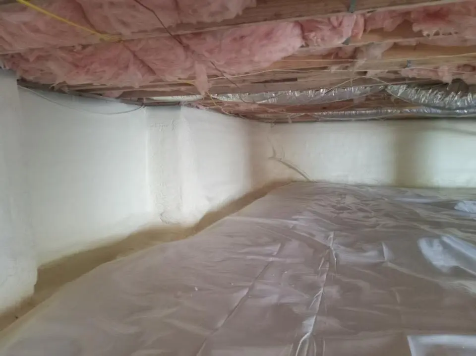 Crawl space encapsulation with closed-cell spray foam for Commercial Roof Restoration in Holdenville